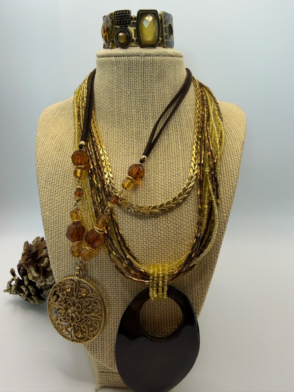 Bundle of 4- Multi-Strand Brown and Gold Pendant Necklace with Filigree Charm - - Picture 9 of 10